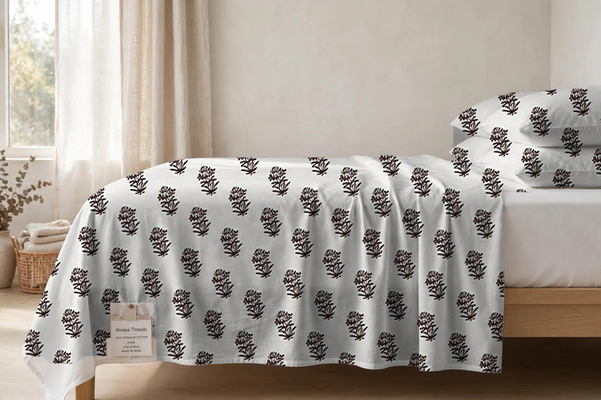 Jhaad Booti Kaapi bedsheet seen from the side, falling over the edge of the bed