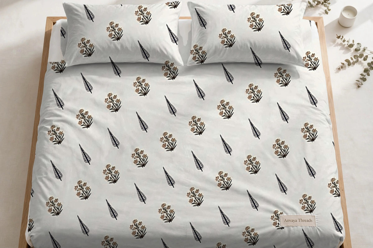 Sarv Booti Kaala bedsheet seen from above, with the pillow covers at the head of the bed