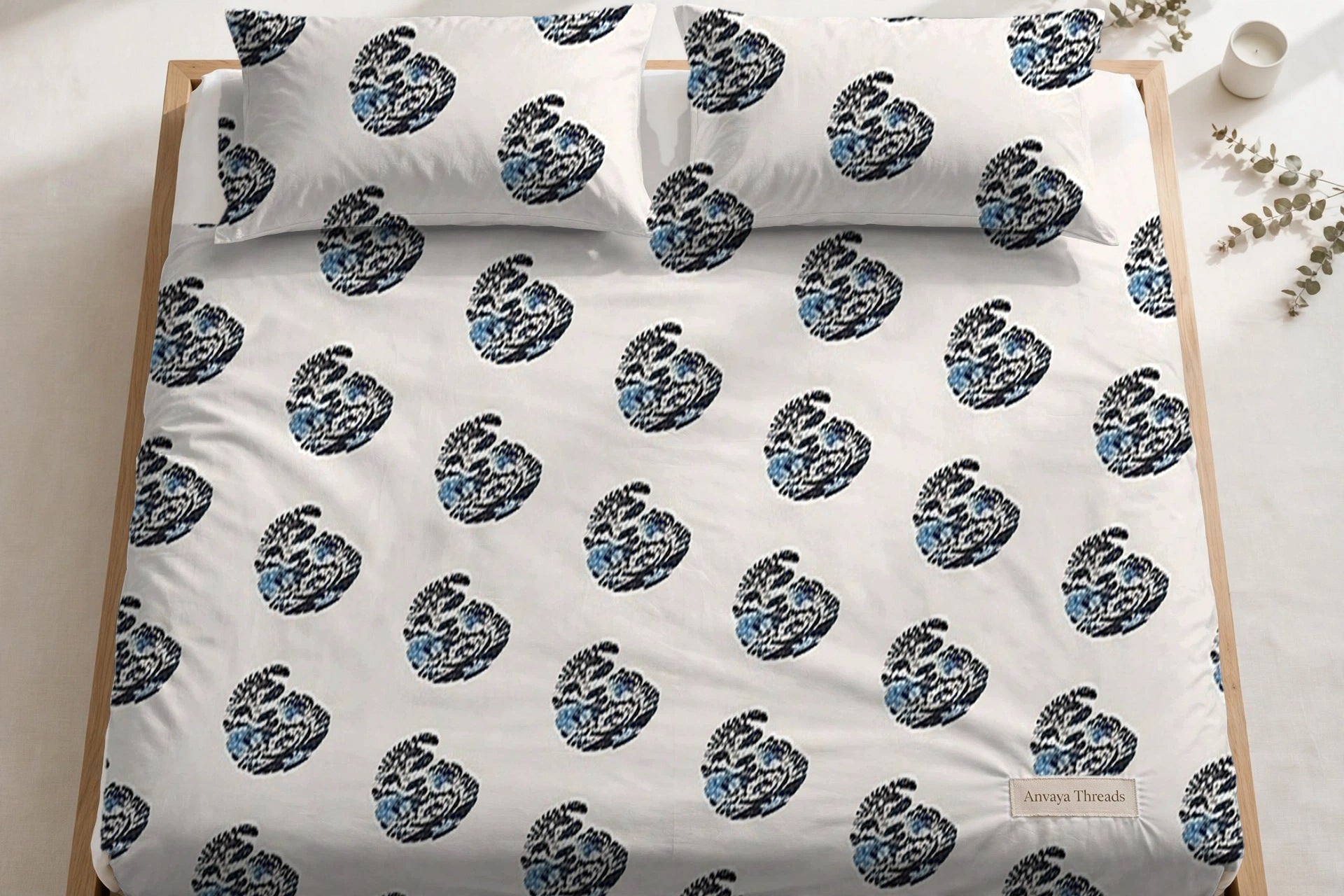 Keri Neel bedsheet seen from above, with the pillow covers at the head of the bed