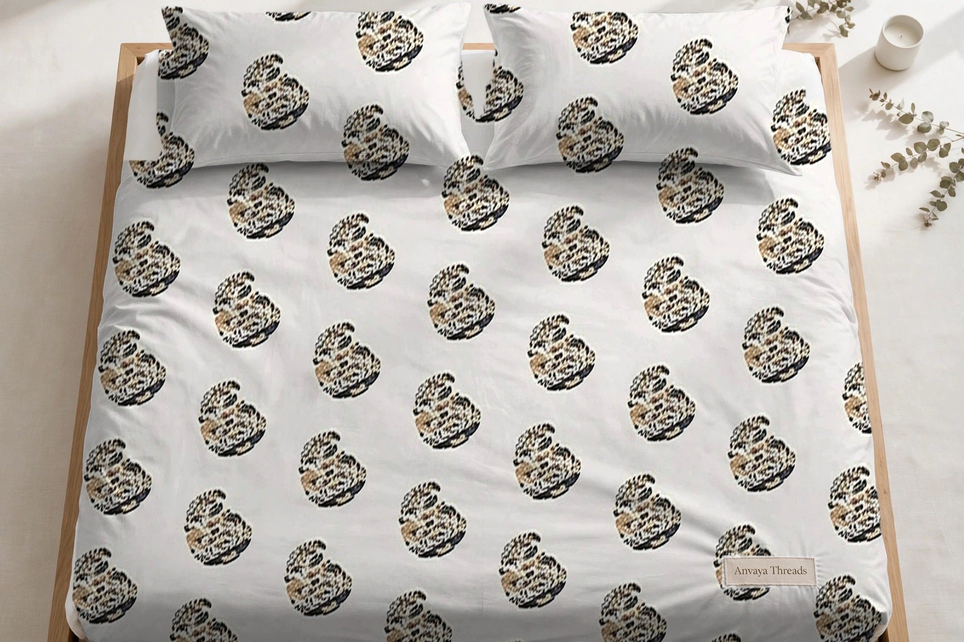 Keri Sona bedsheet seen from above, with the pillow covers at the head of the bed