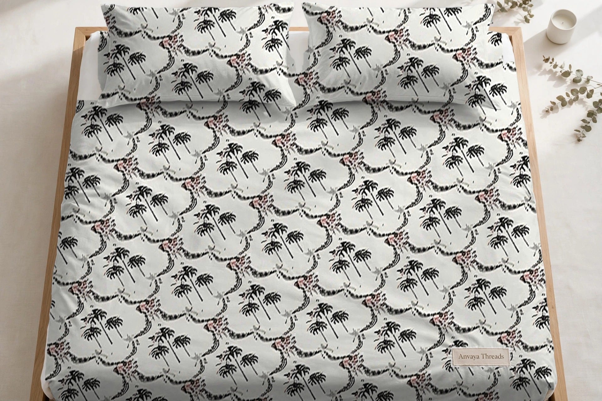Khajoor Jaal Sindoor bedsheet seen from above, with the pillow covers at the head of the bed