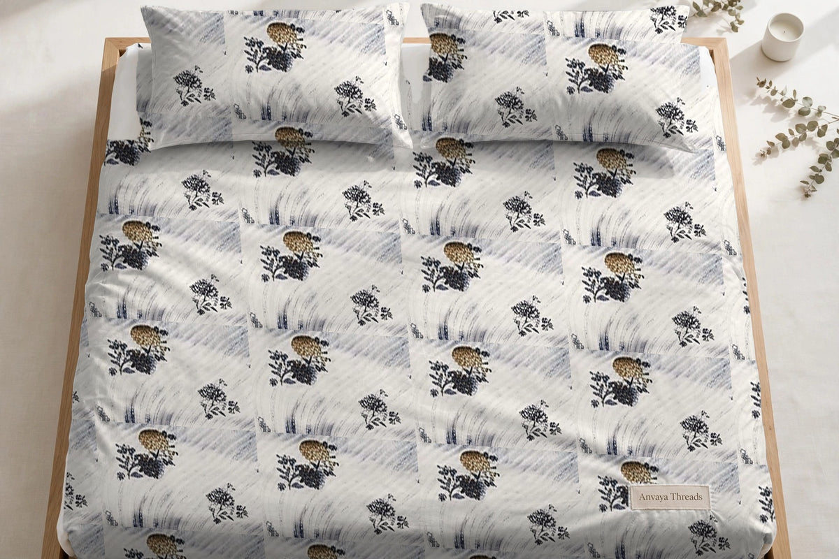 Dhaari Phool Neel bedsheet seen from above, with the pillow covers at the head of the bed