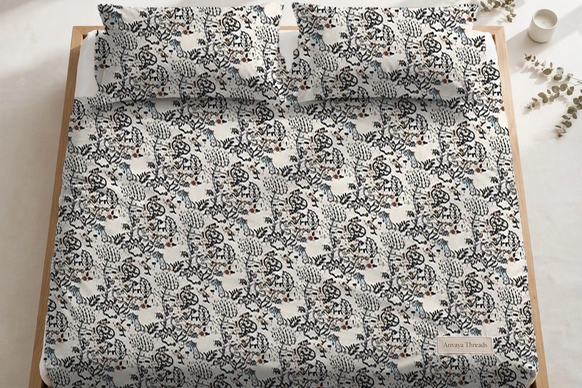 Nakshi Bagh Surmai bedsheet seen from above, with the pillow covers at the head of the bed