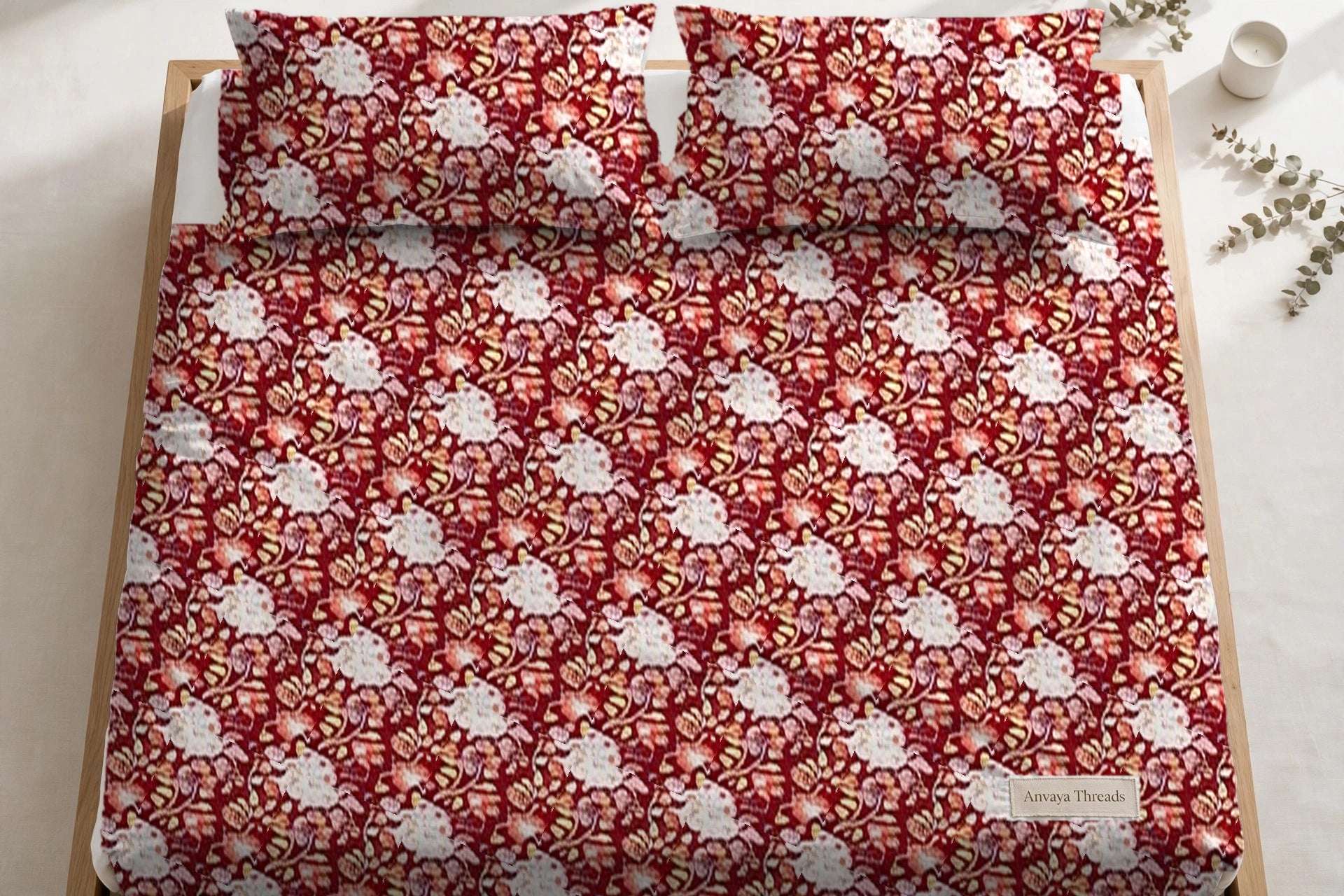 Chandni Bagh Anar bedsheet seen from above, with the pillow covers at the head of the bed