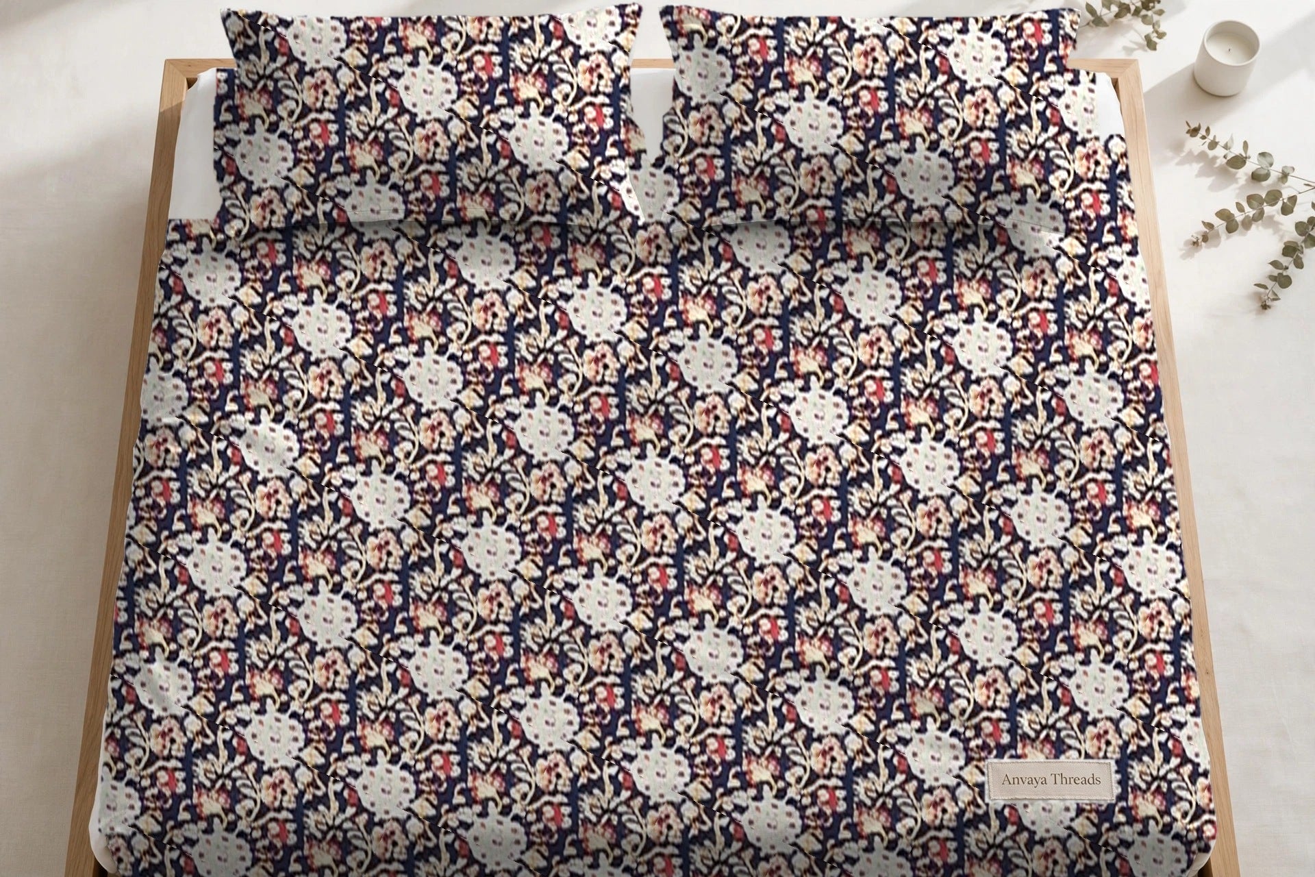 Chandni Bagh Neel bedsheet seen from above, with the pillow covers at the head of the bed