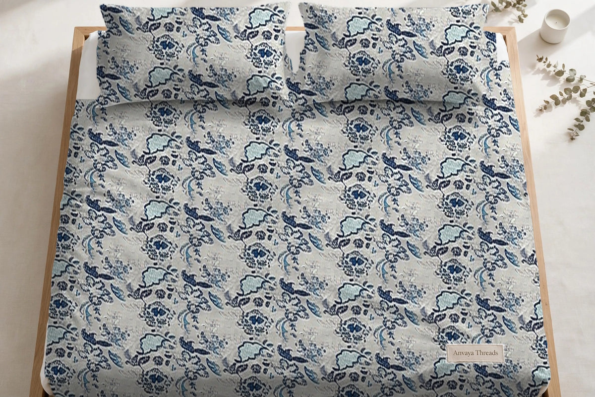 Kalamkari Neel bedsheet seen from above, with the pillow covers at the head of the bed