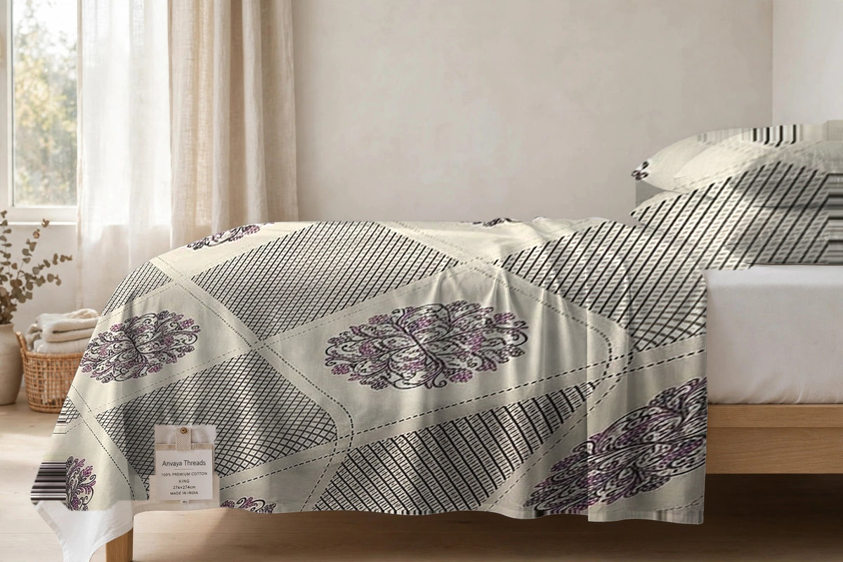 Chowk Mandala Chandan bedsheet seen from the side, falling over the edge of the bed
