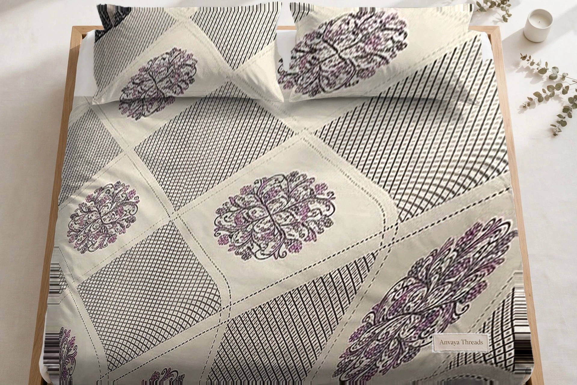 Chowk Mandala Chandan bedsheet seen from above, with the pillow covers at the head of the bed