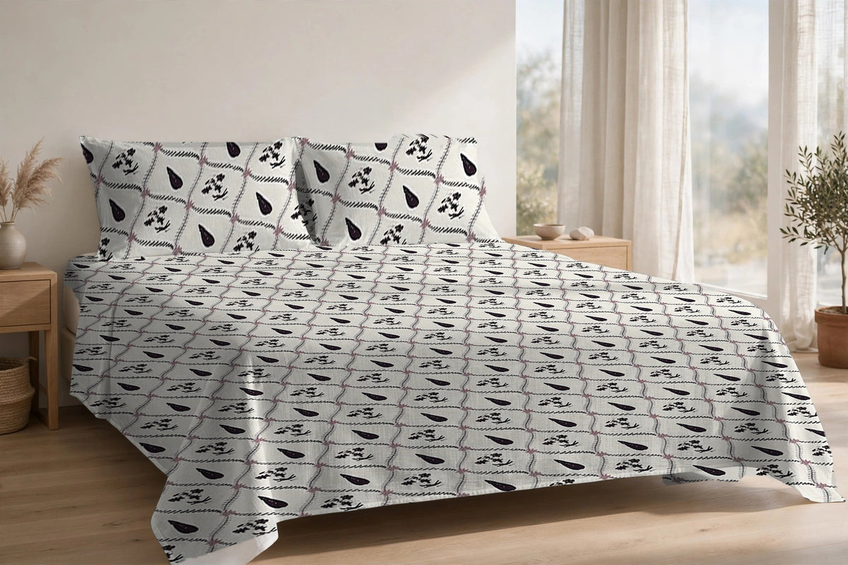Patti Jaal Jamun cotton bedsheet on a made king bed, with matching pillow covers