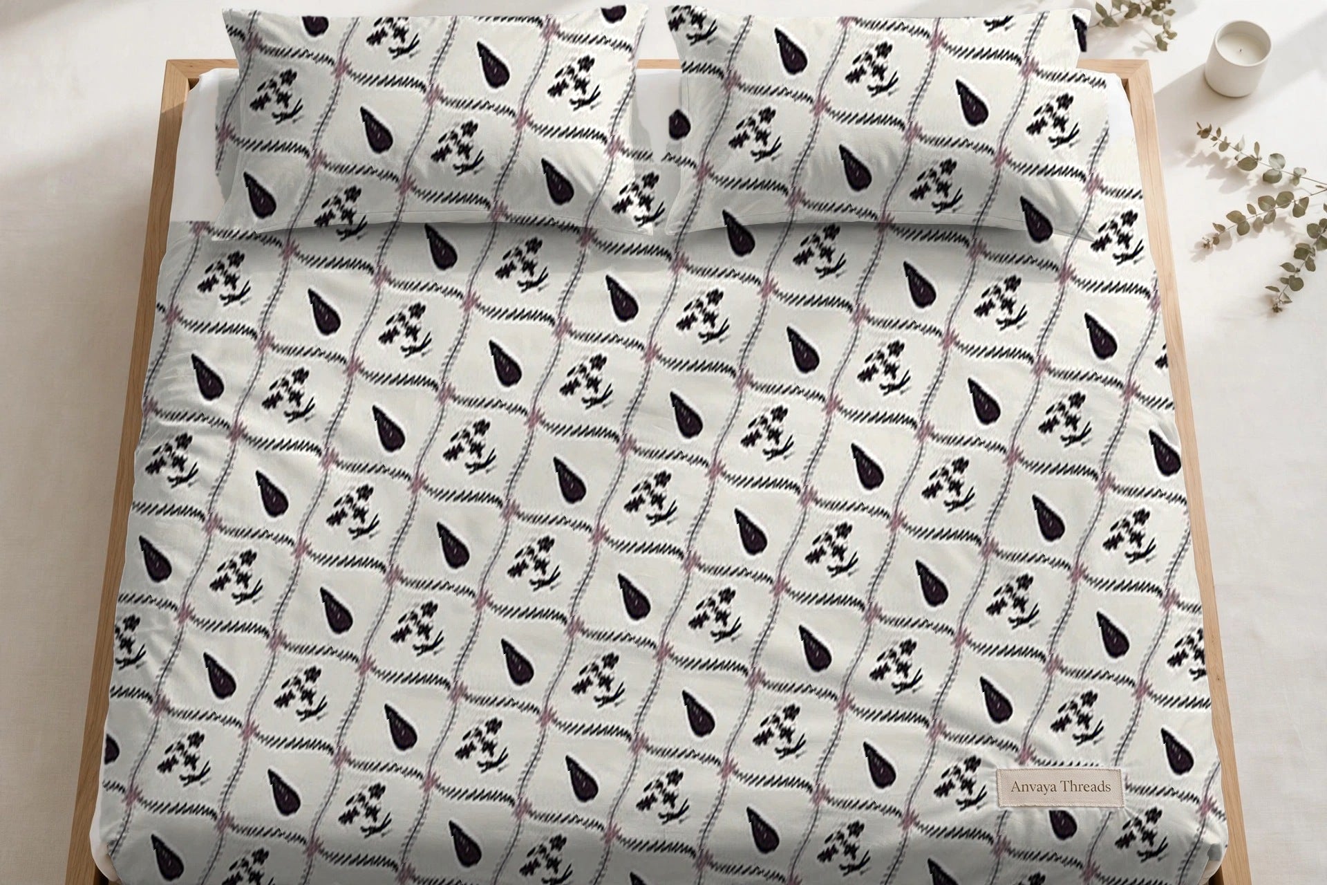 Patti Jaal Jamun bedsheet seen from above, with the pillow covers at the head of the bed