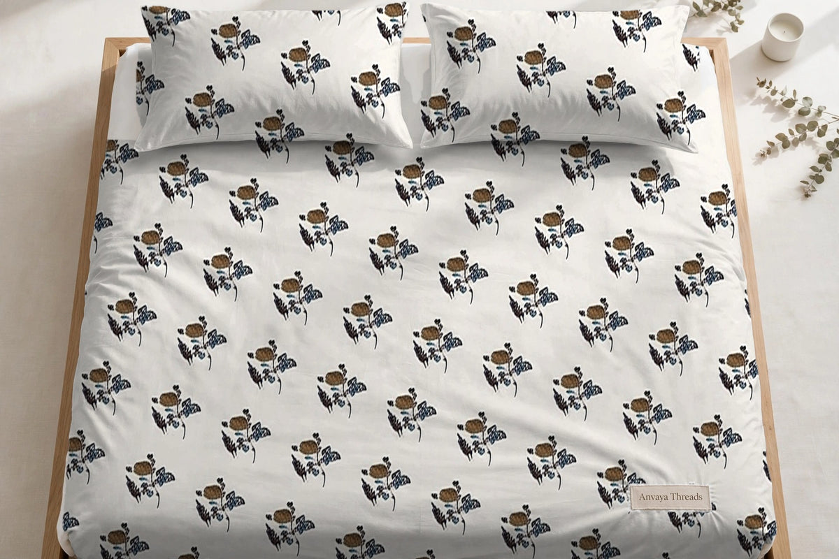 Gulab Kali Firoza bedsheet seen from above, with the pillow covers at the head of the bed