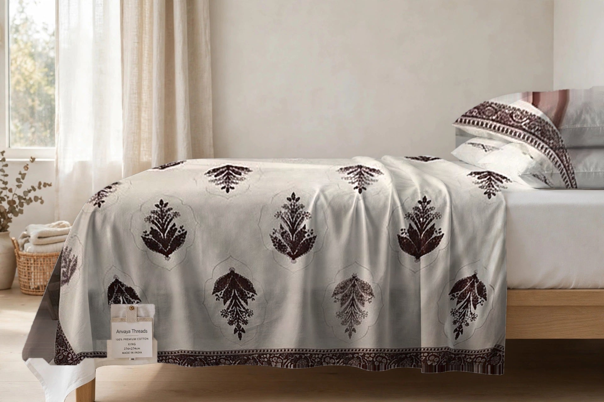 Mehrab Booti Kaapi bedsheet seen from the side, falling over the edge of the bed