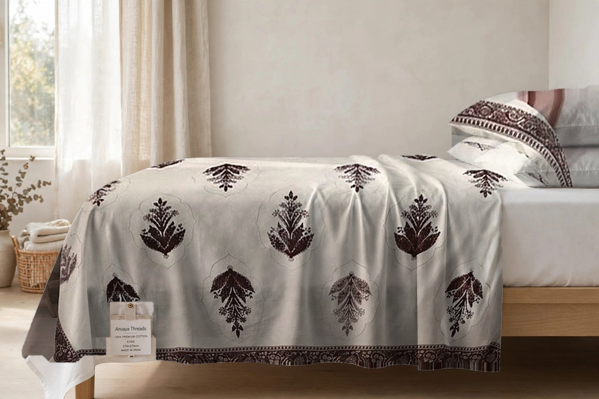 Mehrab Booti Kaapi bedsheet seen from the side, falling over the edge of the bed