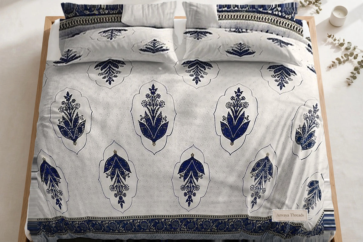 Mehrab Booti Neel bedsheet seen from above, with the pillow covers at the head of the bed
