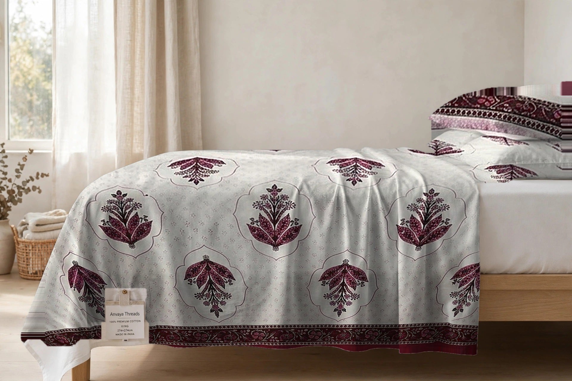 Mehrab Booti Anar bedsheet seen from the side, falling over the edge of the bed