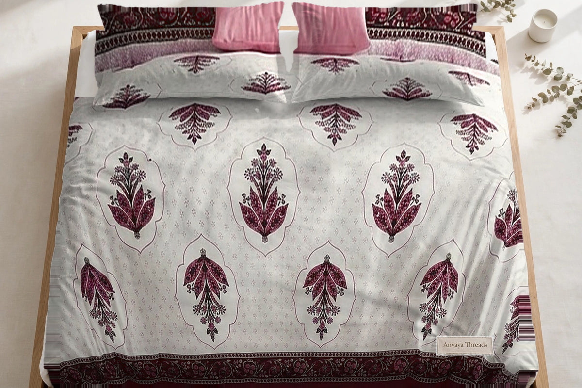 Mehrab Booti Anar bedsheet seen from above, with the pillow covers at the head of the bed