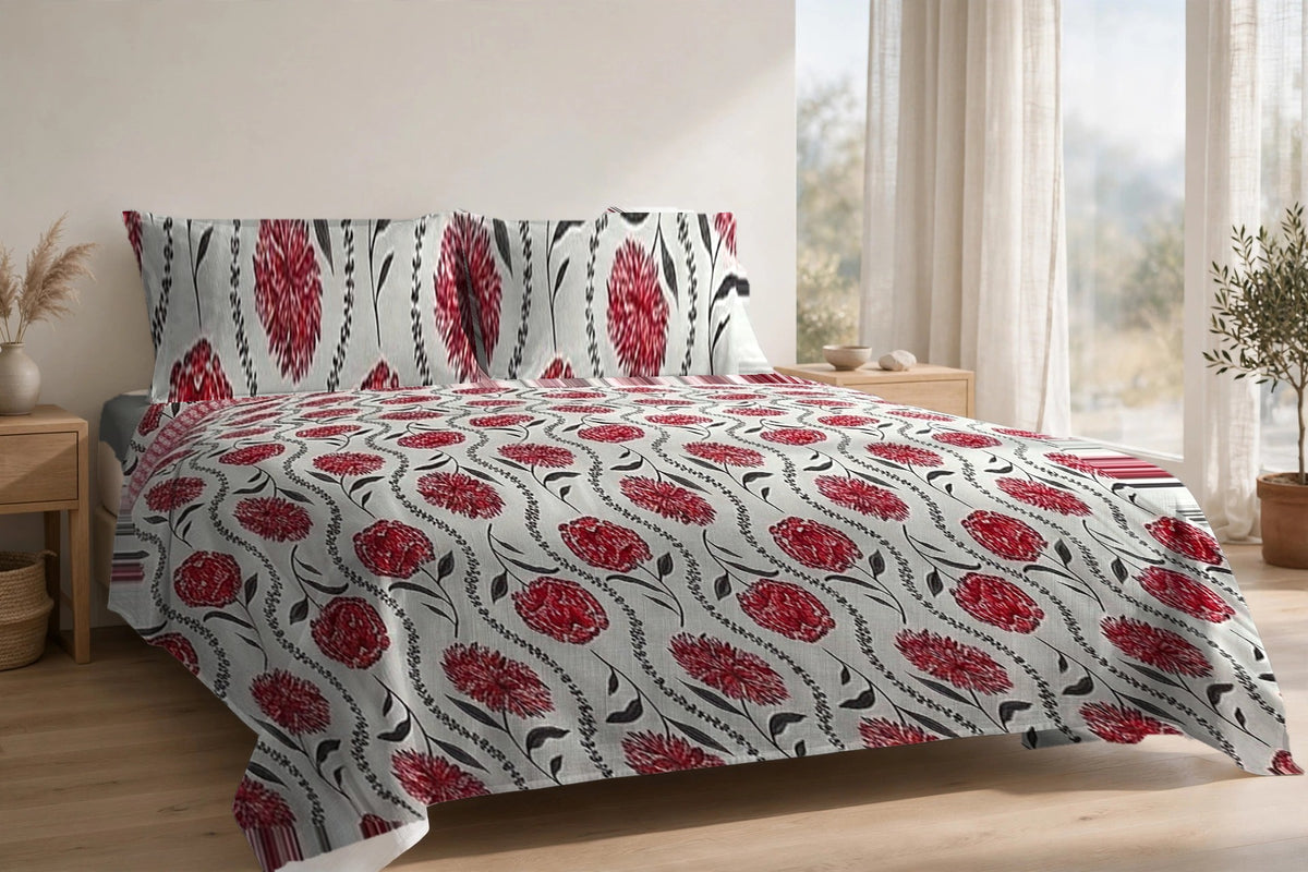 Gulab Bel Anar cotton bedsheet on a made king bed, with matching pillow covers