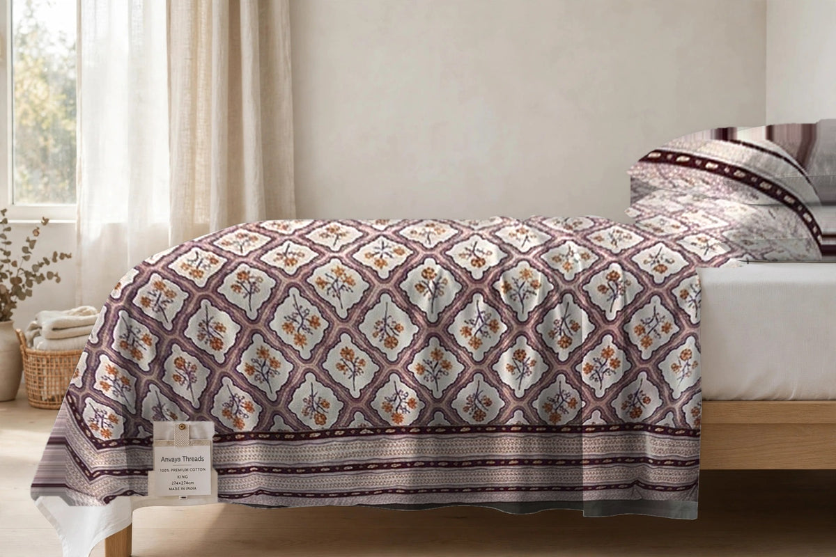 Jharokha Jaal Gulab bedsheet seen from the side, falling over the edge of the bed