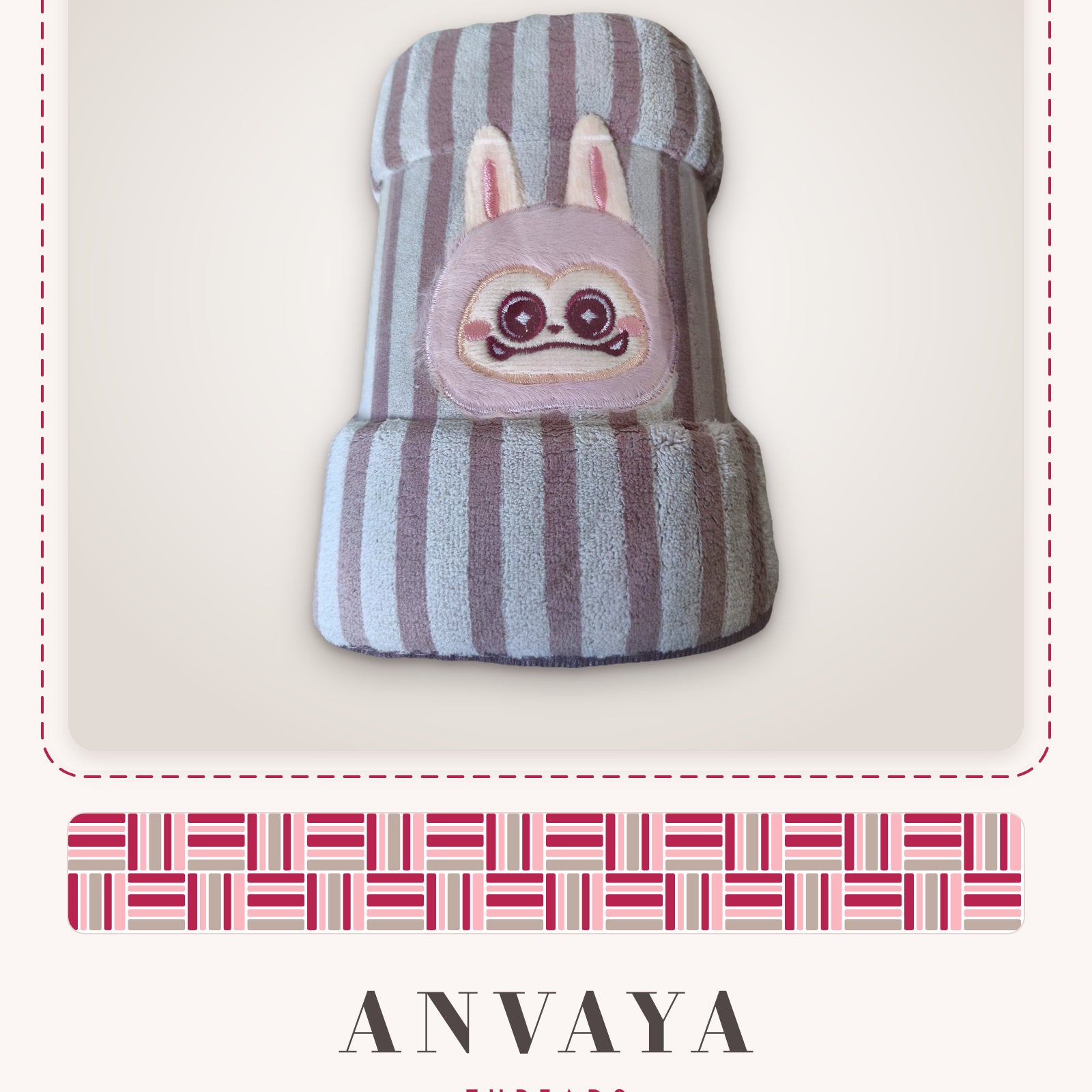 Blush Stripe Bunny kids' hand towel, rolled in a clear wrap with a bunny patch