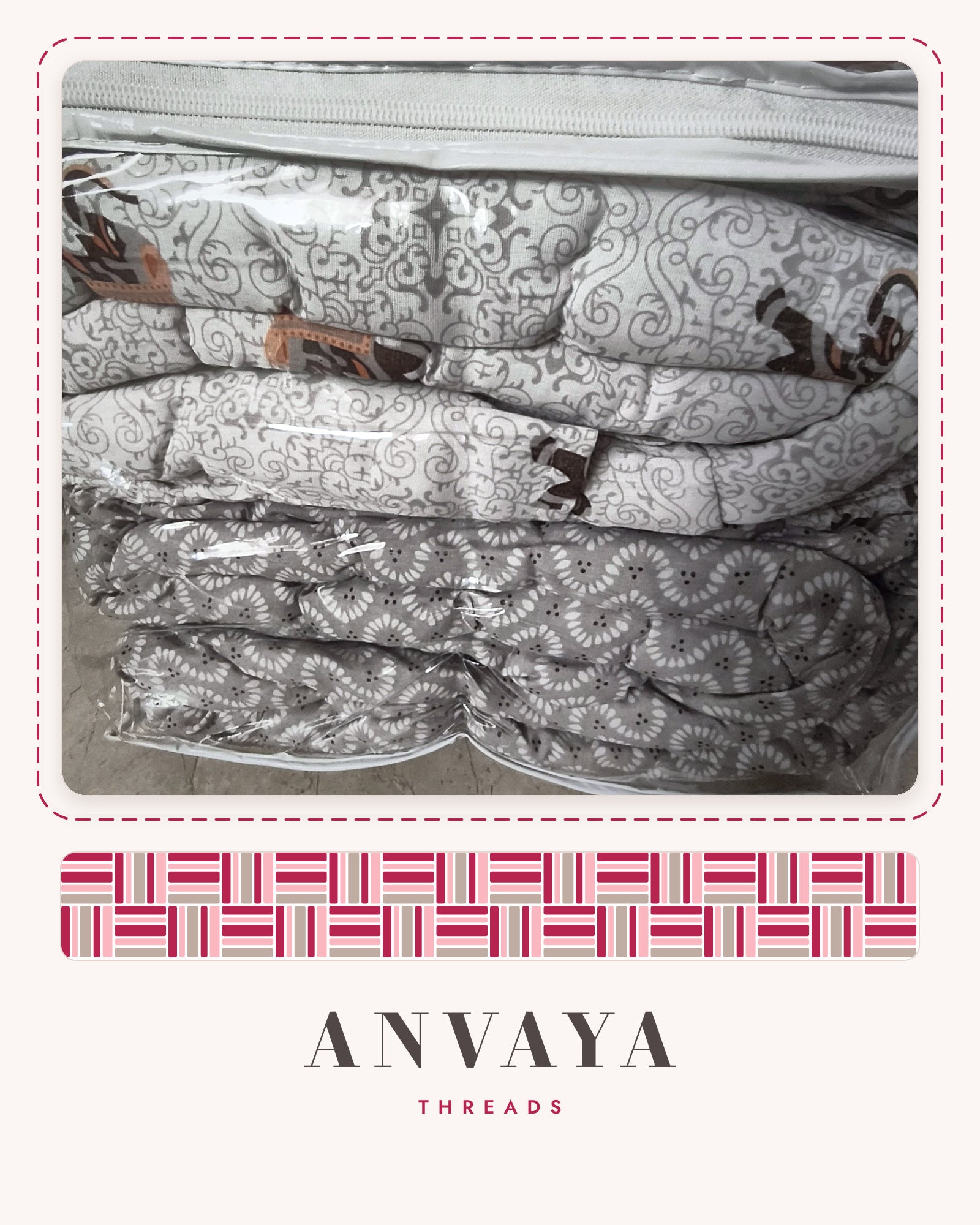 Elephant Jaal Grey comforter folded in its bag, with the grey reverse side showing