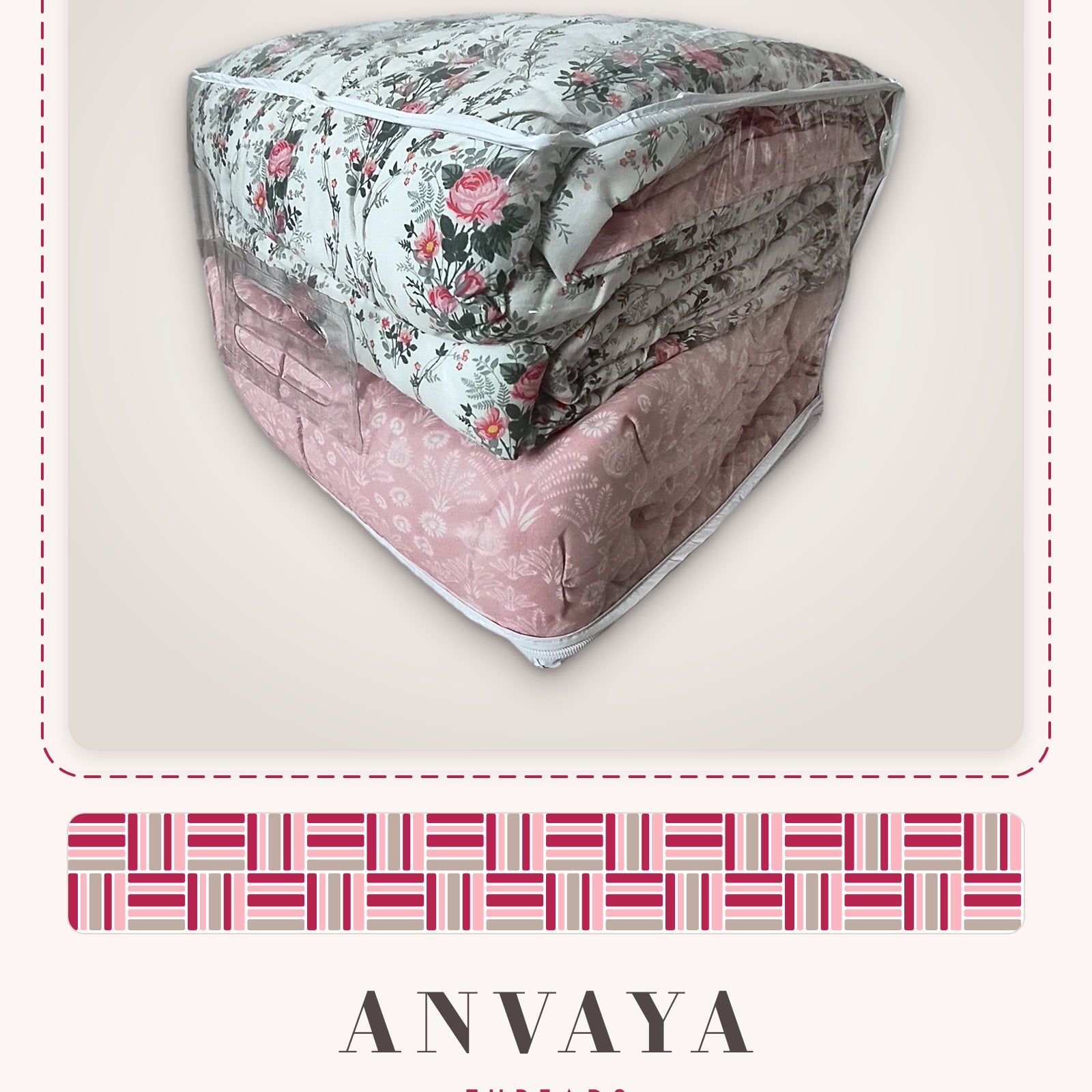Rose Garden Floral comforter folded in its clear zip bag, with the pink reverse side showing