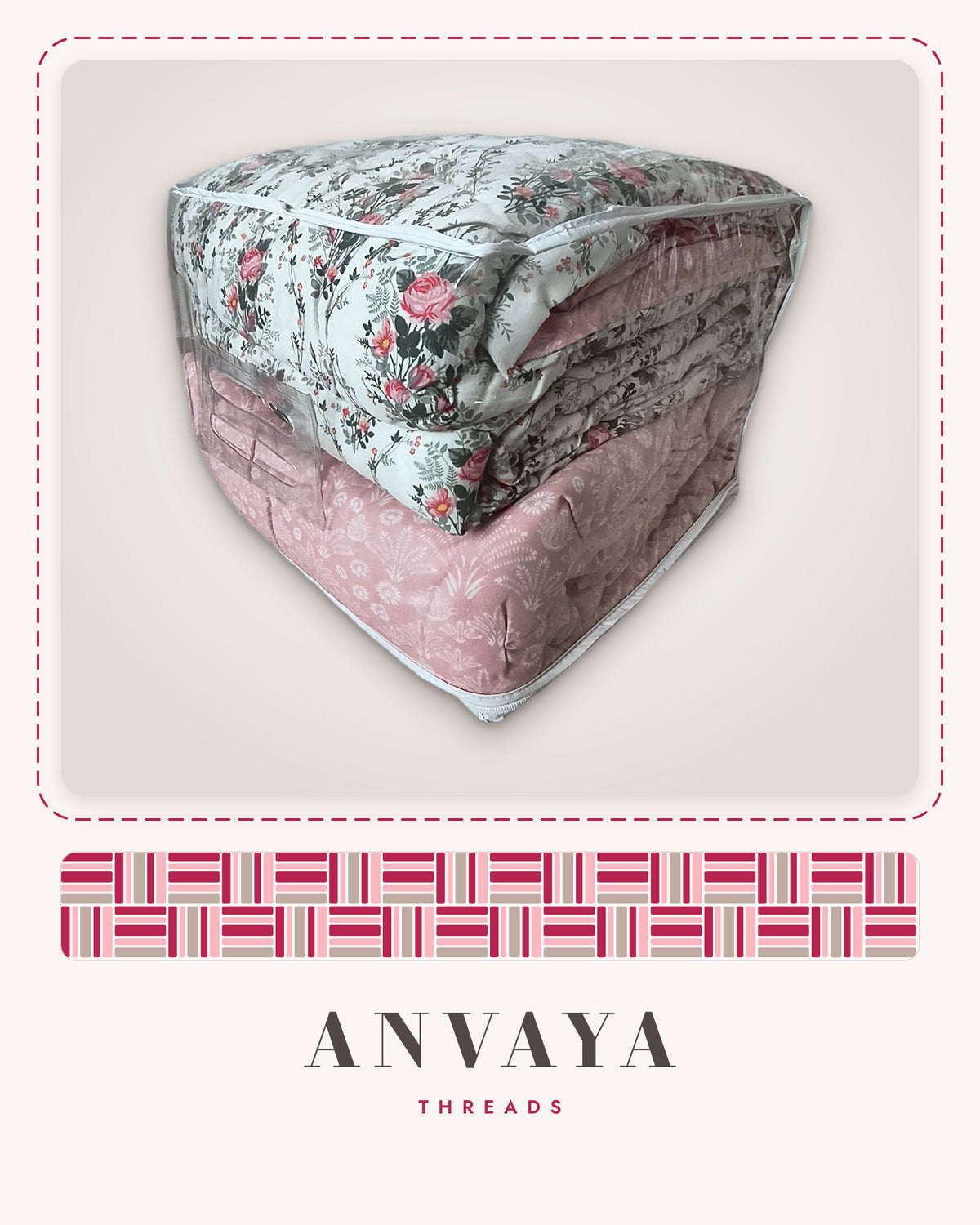 Rose Garden Floral comforter folded in its clear zip bag, with the pink reverse side showing